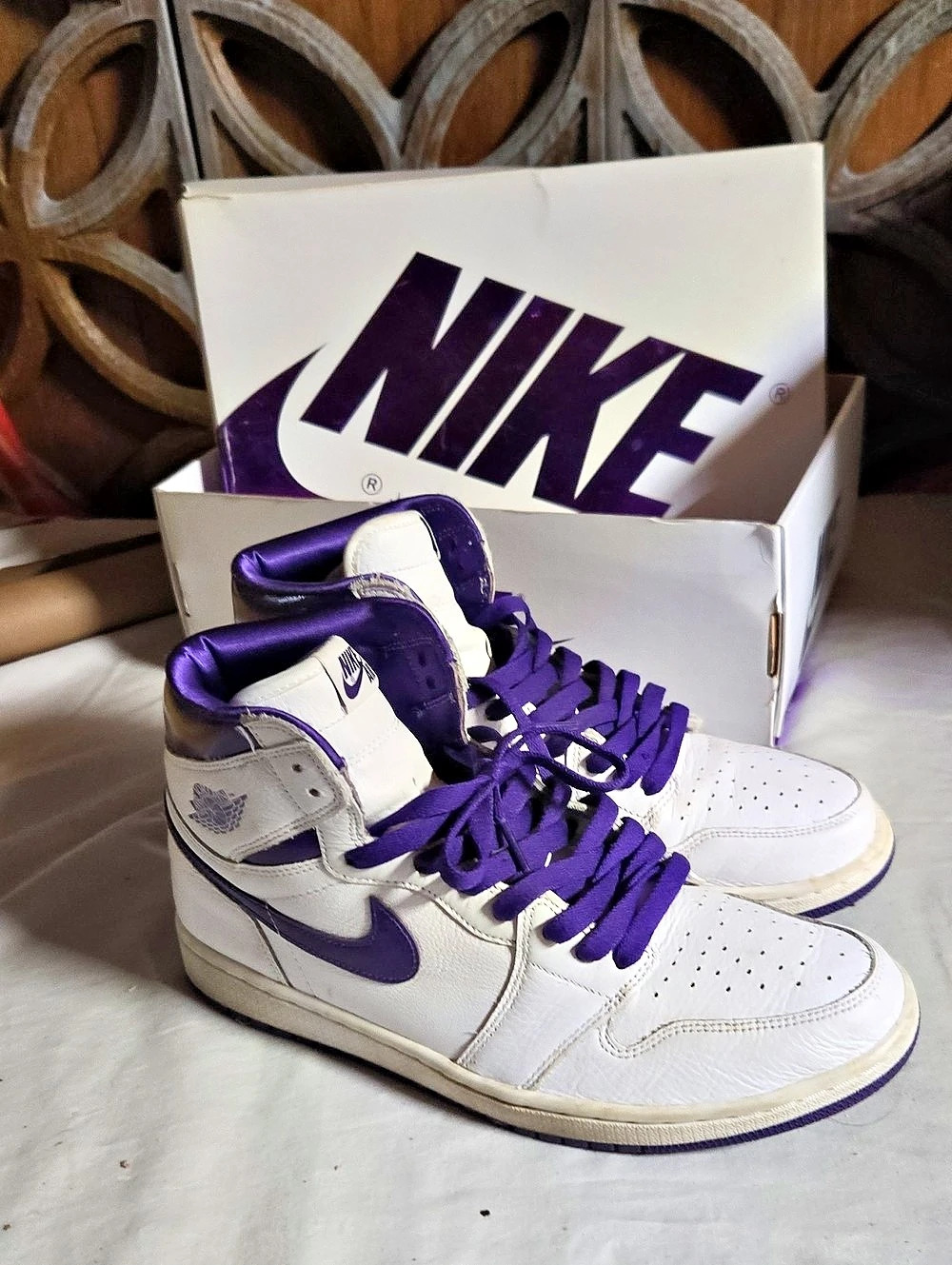 Nike Air Jordan 1 High-Top Sneakers in White & Purple